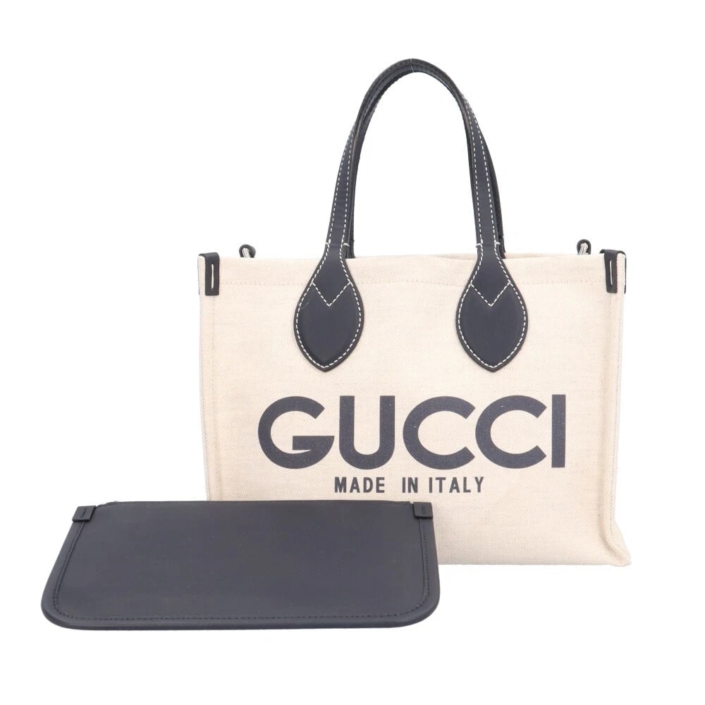GUCCI JAPAN LIMITED HANDBAG CANVAS LEATHER: GUCCI Japan limited Handbag canvas leather Brand: GUCCI Type/Style: Handbag Material: Exterior Material canvas Color: Exterior Color beige / Navy Size: W10.6 x H7.1 x D4.7inch Handle:11.0inch