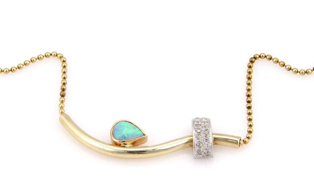 AUSTRALIAN OPAL AND DIAMONDS 14K TRI COLOR GOLD NECKLACE: Australian Opal and Diamonds 14k Tri Color Gold Necklace Brand: None Type/Style: Necklace Material: 14k yellow gold white gold and rose gold Color: none Size: Necklace measurements: approximately 15.7