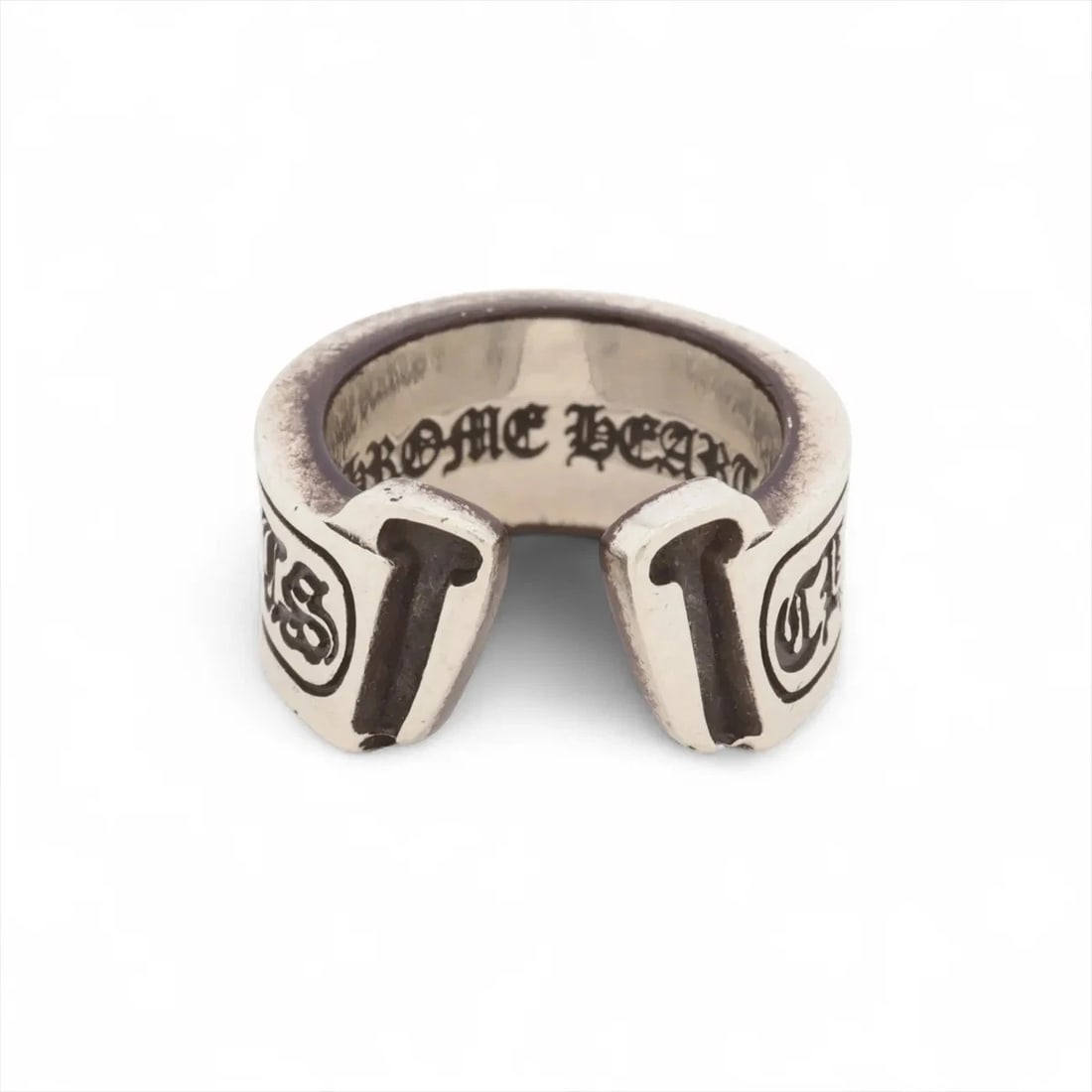CHROME HEARTS LARGE SCROLL LABEL RING: Chrome Hearts large scroll label Ring Brand: Chrome Hearts Type/Style: Ring Material: 925 Color: Silver Size: 7.25 - 7.5 US Accessories: None Accessories Notice: When purchasing pre-owned goods,
