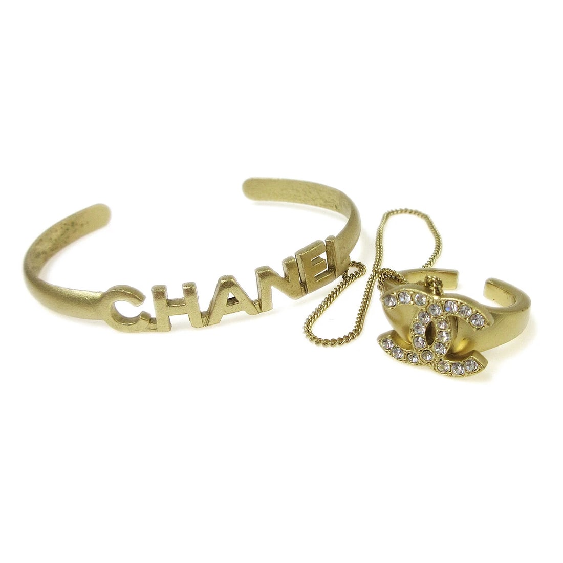CHANEL RHINESTONE BANGLE CHAIN RING: Chanel Rhinestone Bangle Chain Ring Brand: Chanel Type/Style: Bracelet Material: Gold-tone, Main Stone/Creation Rhinestone Color: GOLD Size: Bangle/ Inner circumference : 15.0 cm Ring/Inner