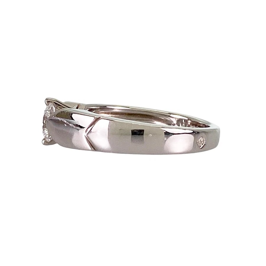 CHAUMET PLUME SOLITAIRE PLATINUM DIAMOND RING: Chaumet Plume Solitaire Platinum Diamond Ring Brand: Chaumet Type/Style: Ring Material: Platinum 950, Main Stone/Creation NATURAL Color: Silver Size: US:4 Accessories: None Accessories Notice: When