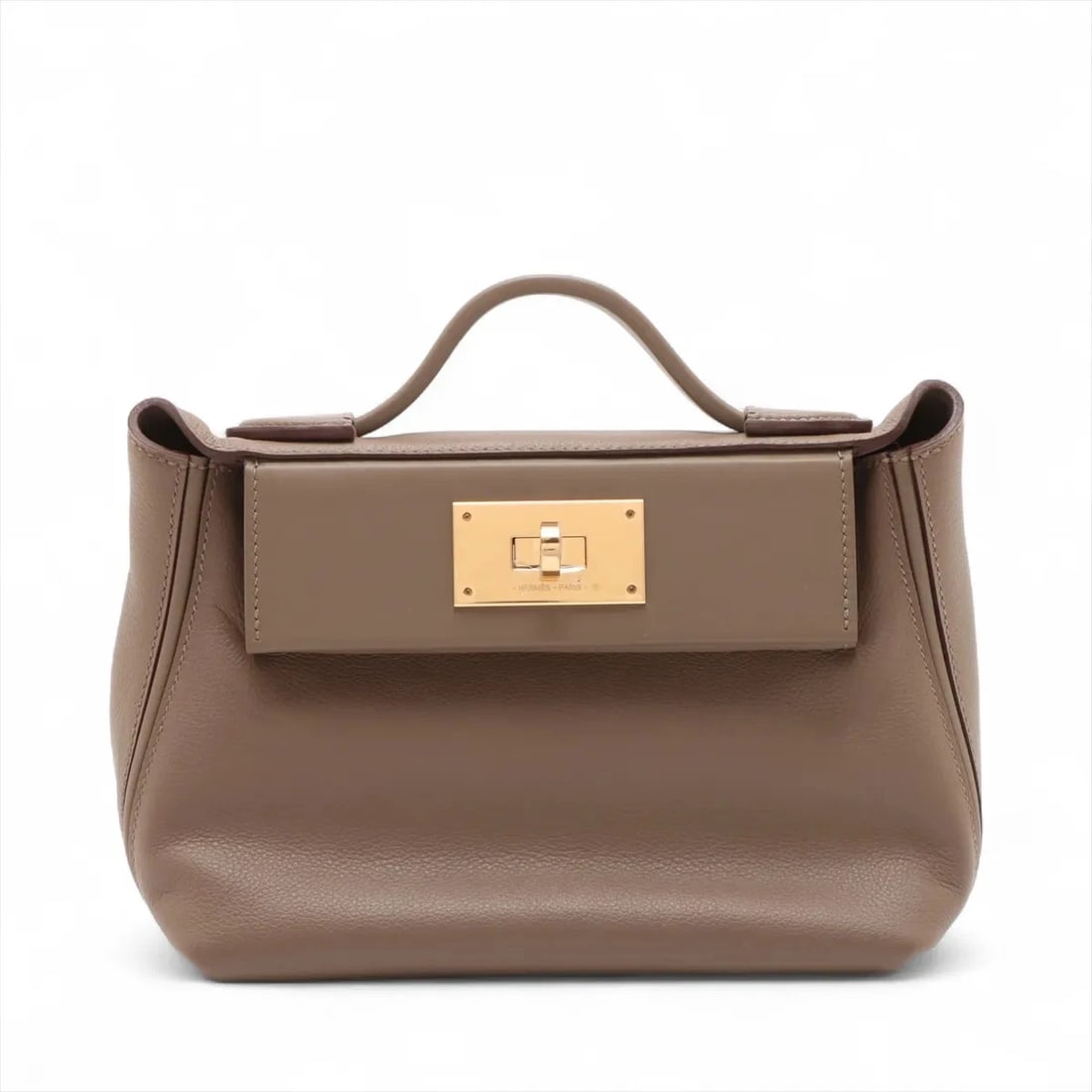 HERMES SACKS LE VINGT CUATRE 24/24 MINI 21 HANDBAG: Hermes sacks Le Vingt Cuatre 24/24 mini 21 Handbag Brand: Hermès Type/Style: Hand bag Material: Evercolor x Veau Swift Color: Etoupe Size: Height:6.5inch Length:8.1inch Depth:4.3inch Handle height:1.
