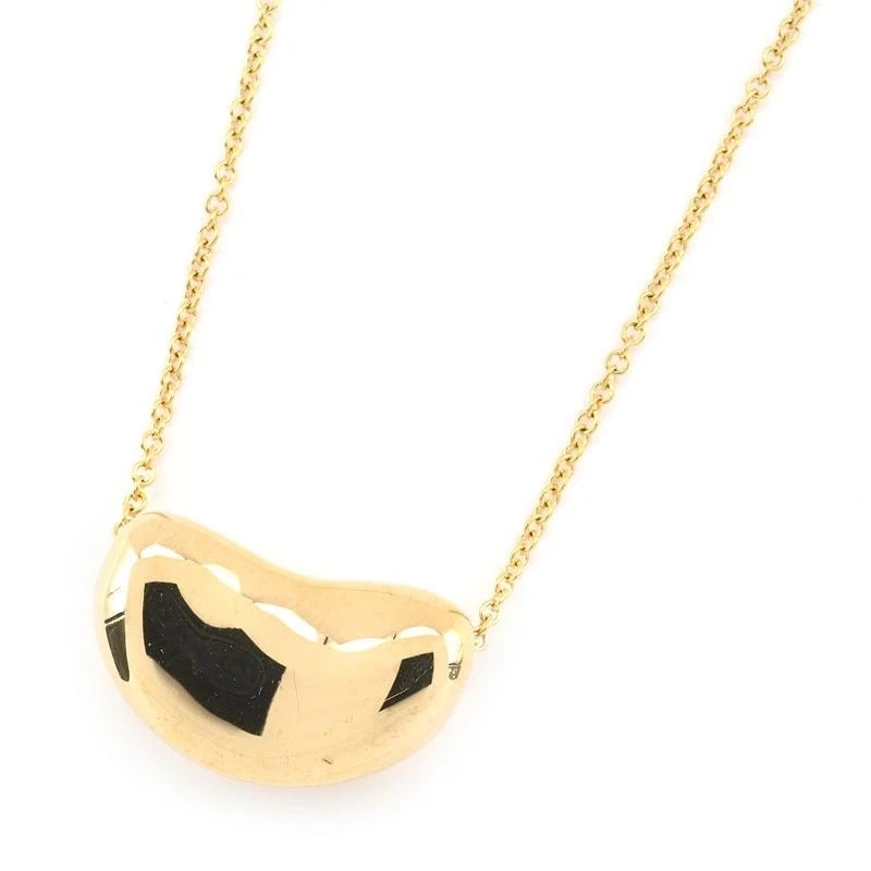 TIFFANY & CO. ELSA PERETTI BEAN DESIGN PENDANT: Tiffany & Co. Elsa Peretti Bean Design Pendant Brand: Tiffany & Co. Type/Style: Pendant Material: K18YG Color: YG Size: Effective length 40cm Chain width 0.9mm Motif 18.0mm x 10.8mm Accessories: None