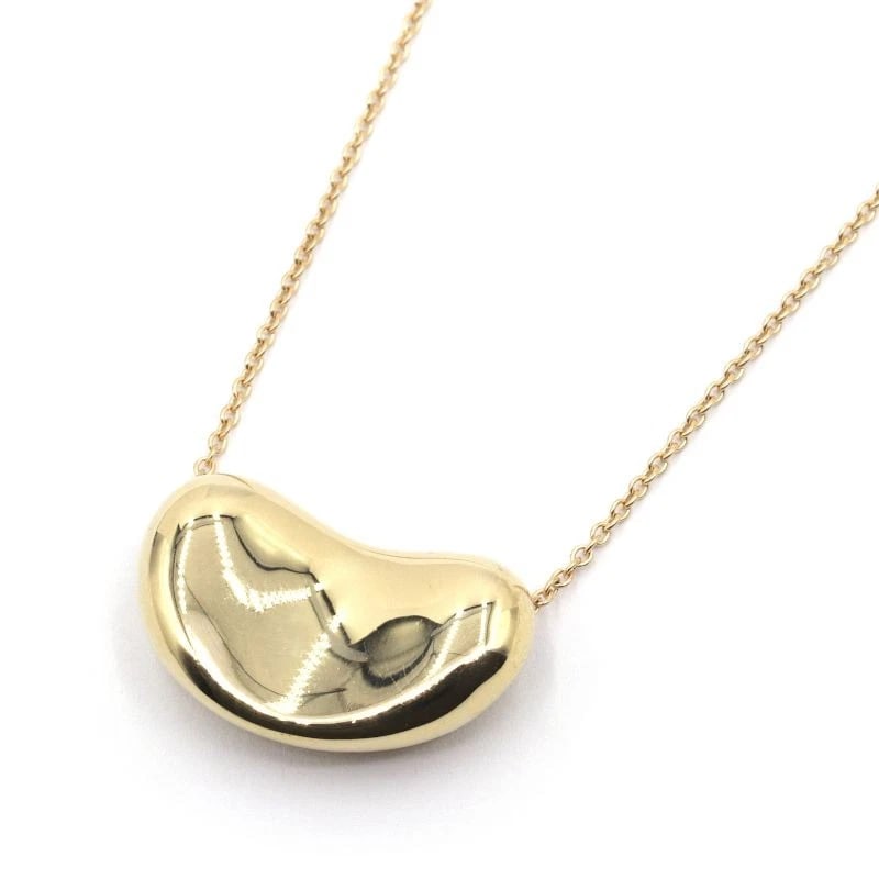 TIFFANY & CO. ELSA PERETTI BEAN DESIGN PENDANT: Tiffany & Co. Elsa Peretti Bean Design Pendant Brand: Tiffany & Co. Type/Style: Pendant Material: K18YG Color: YG Size: Effective length 40cm Chain width 1.0mm Motif 20.5mm x 12.8mm Accessories: N
