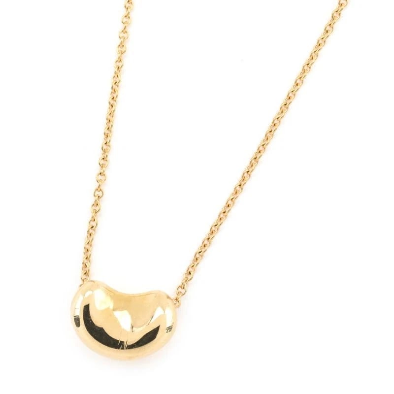 TIFFANY & CO. ELSA PERETTI BEAN DESIGN PENDANT: Tiffany & Co. Elsa Peretti Bean Design Pendant Brand: Tiffany & Co. Type/Style: Pendant Material: K18YG Color: YG Size: Effective length 40cm Chain width 0.6mm Motif 10.5mm x 7.5mm Accessories: None