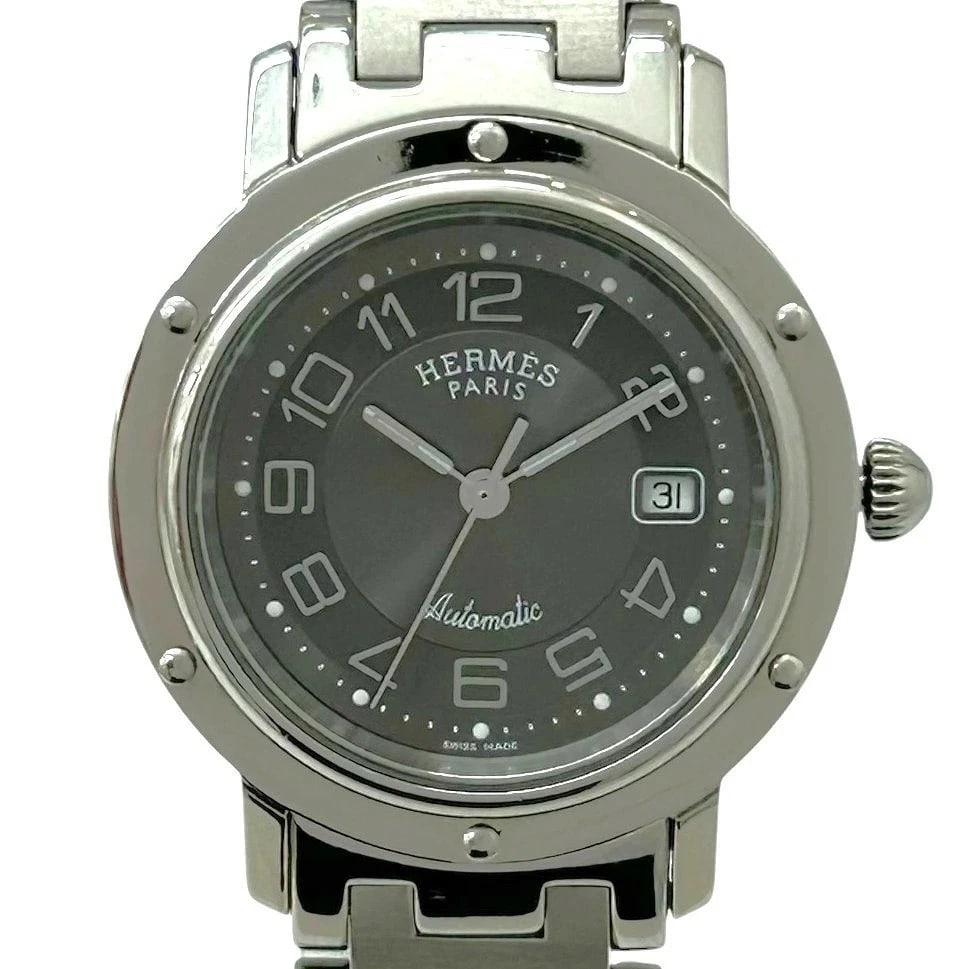 HERMES CLIPPER AUTOMATIC DATE BOYS GRAY DIAL WATCH: HERMES Clipper Automatic Date Boys Gray Dial Watch Brand: HERMES Type: Wristwatch Material: Stainless Steel Color: Dial color gray Size: Case width: Approx. 31mm Arm circumference (approx.): 16cm
