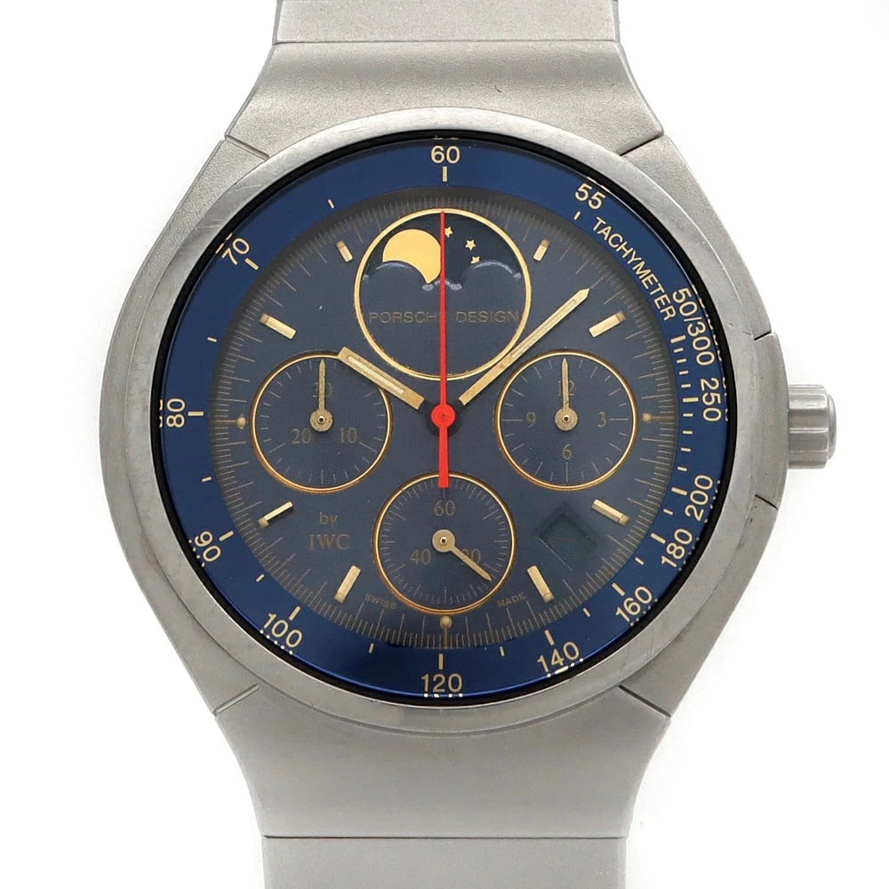 PORSCHE DESIGN BY IWC CHRONOGRAPH QUARTZ WATCH NAVY: PORSCHE DESIGN By IWC Chronograph Quartz Watch Navy Brand: IWC Type: Wristwatch Material: titanium Color: Dial color navy Size: Approximately 36 mm (excluding crown) Arm circumference: maximum approxi