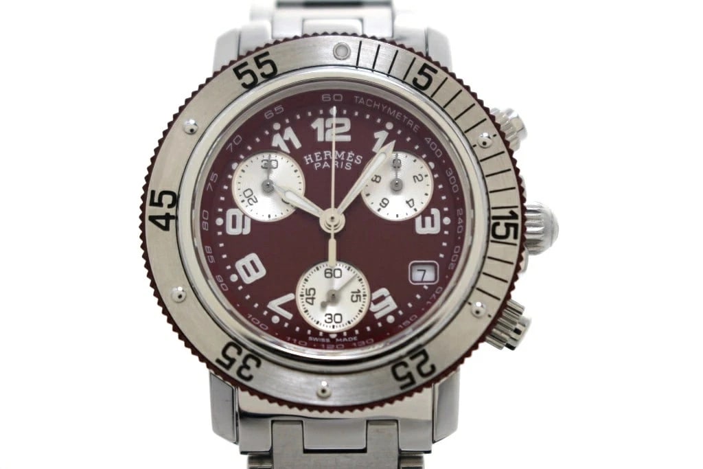 HERMES CLIPPER DIVER CHRONO QUARTZ BORDEAUX DIAL WATCH: HERMES Clipper Diver Chrono Quartz Bordeaux Dial Watch Brand: HERMES Type: Wristwatch Material: Stainless steel/Sapphire crystal Color: Dial color Bordeaux x Bordeaux dial Size: Size case: approx.
