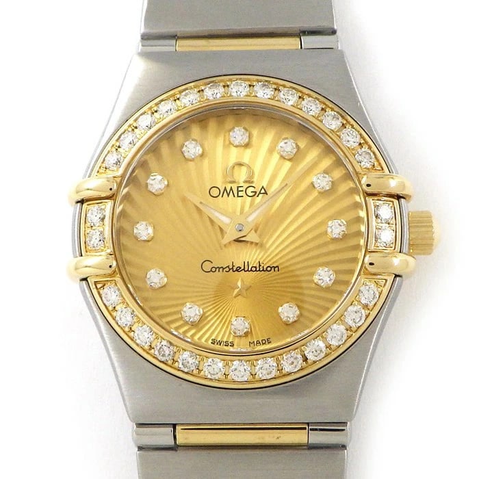 OMEGA WATCH CONSTELLATION MINI QUARTZ GOLD GUILLOCHE DIAMOND BEZEL WATCH: Omega Watch Constellation Mini Quartz Gold Guilloche Diamond Bezel Watch Brand: OMEGA Type: Wristwatch Material: SSYG Color: Dial color gold Size: Case diameter approximately 21.0mm Accessories: None