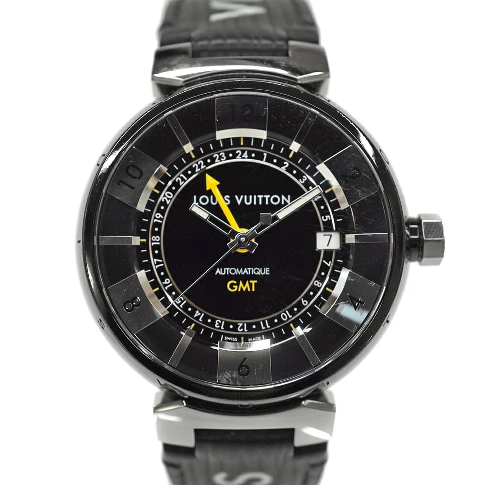 LOUIS VUITTON TAMBOUR IN BLACK GMT STAINLESS STEEL LEATHER BELT WATCH: Louis Vuitton Tambour in Black GMT Stainless Steel Leather Belt Watch Brand: LOUIS VUITTON Type: Wristwatch Material: ss leather Color: Dial color black Size: Case: approx. 41.5mm Arm circumference: a