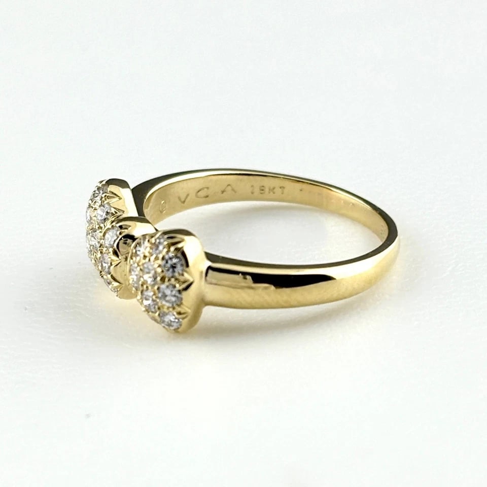 VAN CLEEF ? ARPELS RIBBON MOTIF YG MELEE DIAMOND RING: Van Cleef ? Arpels Ribbon motif YG melee diamond Ring Brand: Van Cleef ? Arpels Type/Style: Ring Material: 18K YG, Main Stone/Creation Natural Color: YG Size: US 6.5 Accessories: None Accessories
