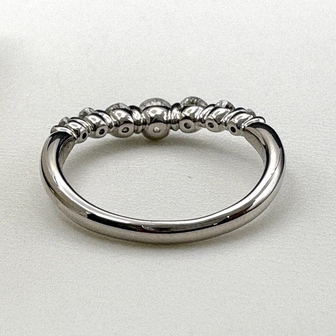 MELEE DIAMOND DESIGN PLATINUM RING - 4