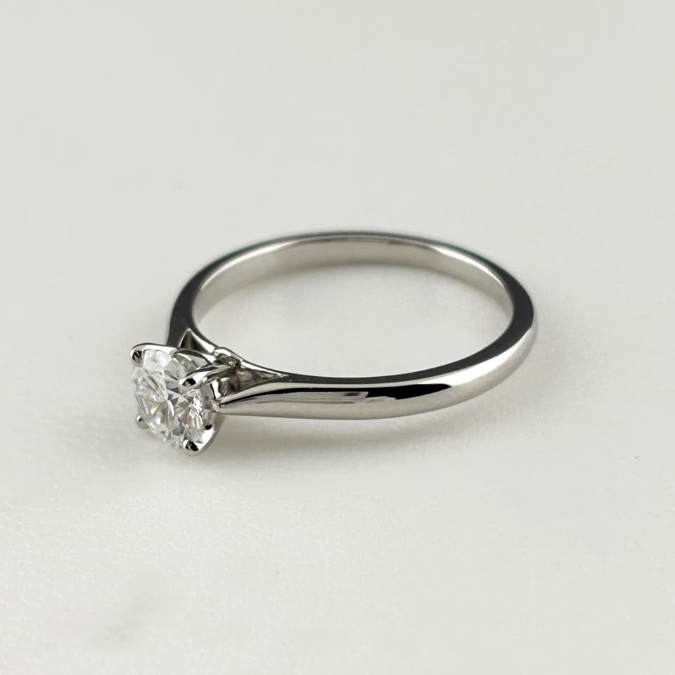 CARTIER SOLITAIRE PLATINUM RING: CARTIER Solitaire Platinum Ring Brand: CARTIER Type/Style: Ring Material: Pt950, Main Stone/Creation Natural Color: None Size: US 5 Accessories: None Accessories Notice: When purchasing pre-owned