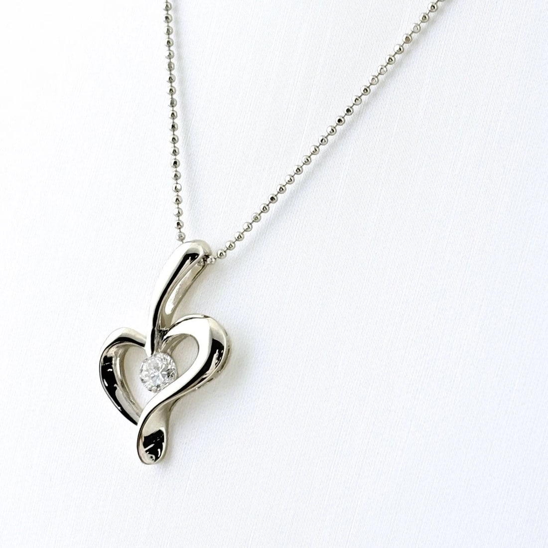 DIAMOND DESIGN PLATINUM PENDANT NECKLACE DIAMOND: Diamond design Platinum Pendant Necklace diamond Brand: Unbranded Type/Style: Necklace Material: Pt900 Pt850, Main Stone/Creation Natural Color: None Size: Chain / code 40cm(15.7") Chain width 0.9mm(0