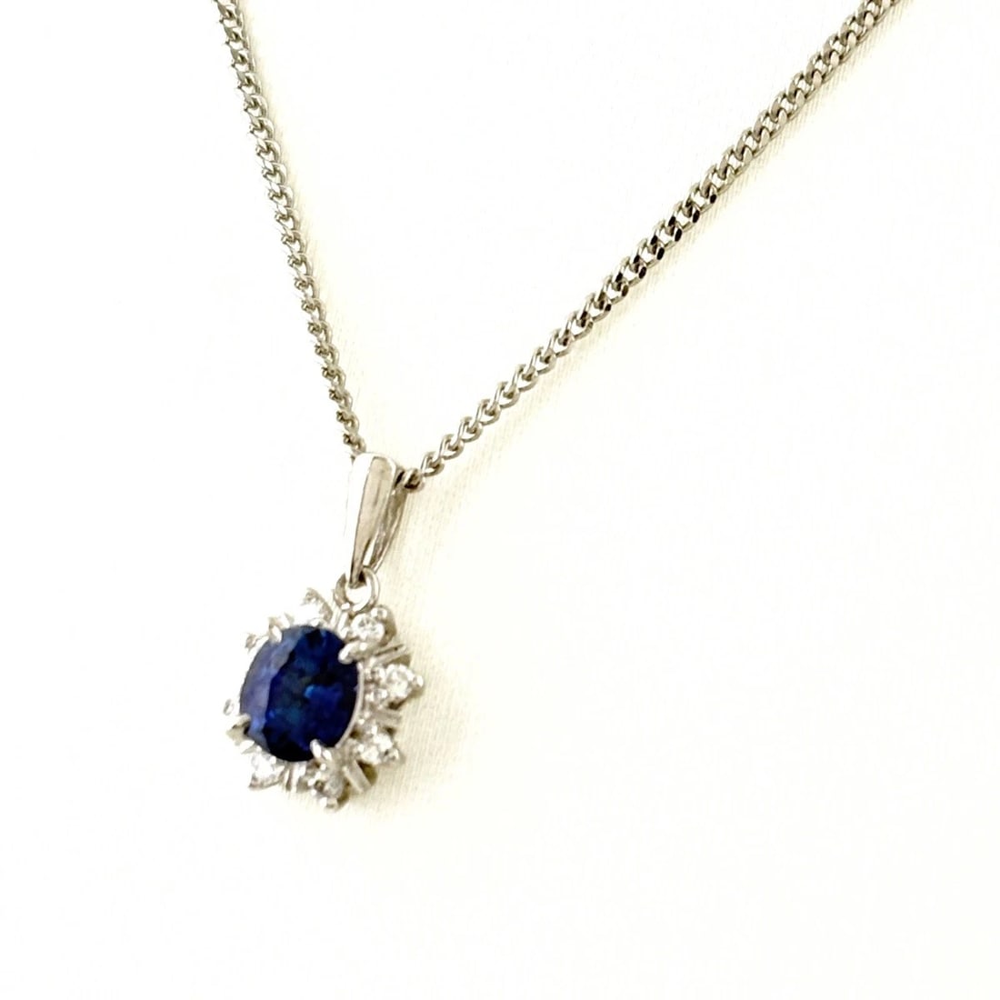 SAPPHIRE DESIGN NECKLACE PLATINUM PENDANT MELEE DIAMOND: Sapphire design necklace Platinum Pendant melee diamond Brand: Unbranded Type/Style: Necklace Material: Pt900 Pt850, Main Stone/Creation Sapphire Diamond Color: None Size: Chain / code