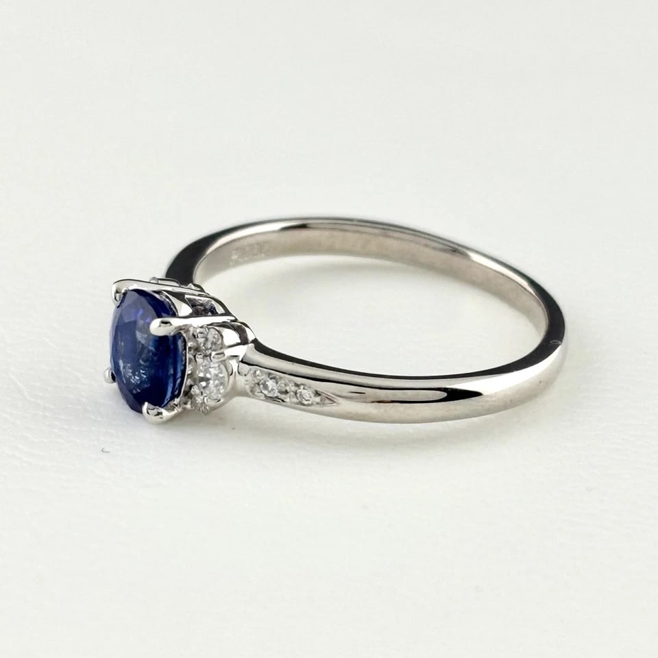 SAPPHIRE DESIGN PLATINUM MELEE DIAMOND RING: sapphire design Platinum melee diamond Ring Brand: Unbranded Type/Style: Ring Material: Pt900, Main Stone/Creation sapphire diamond Color: None Size: US 7 to 7.5 Accessories: None Accessories Notice: