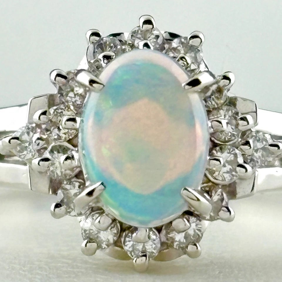 OPAL DESIGN PLATINUM MELEE DIAMOND RING: opal design Platinum melee diamond Ring Brand: Unbranded Type/Style: Ring Material: Platinum900, Main Stone/Creation opal?diamond Color: None Size: US 6.5 to 7 Accessories: None Accessories Notice: