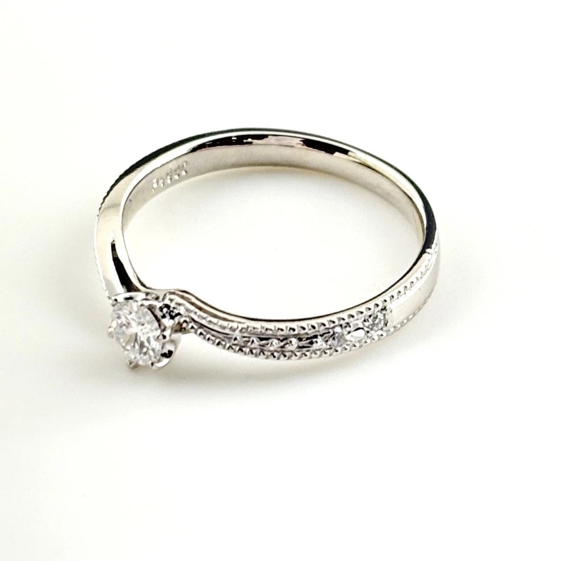 MELEE DIAMOND DESIGN PLATINUM RING - 3