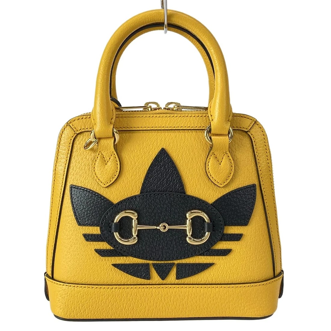 GUCCI YELLOW BLACK LEATHER HANDBAG: GUCCI Yellow Black Leather Handbag Brand: GUCCI Type/Style: Handbag Material: Exterior Material Leather Color: Exterior Color Yellow, Black Size: Height : 7.09 inch (18 cm) Width : 7.87 inch (20 cm) D