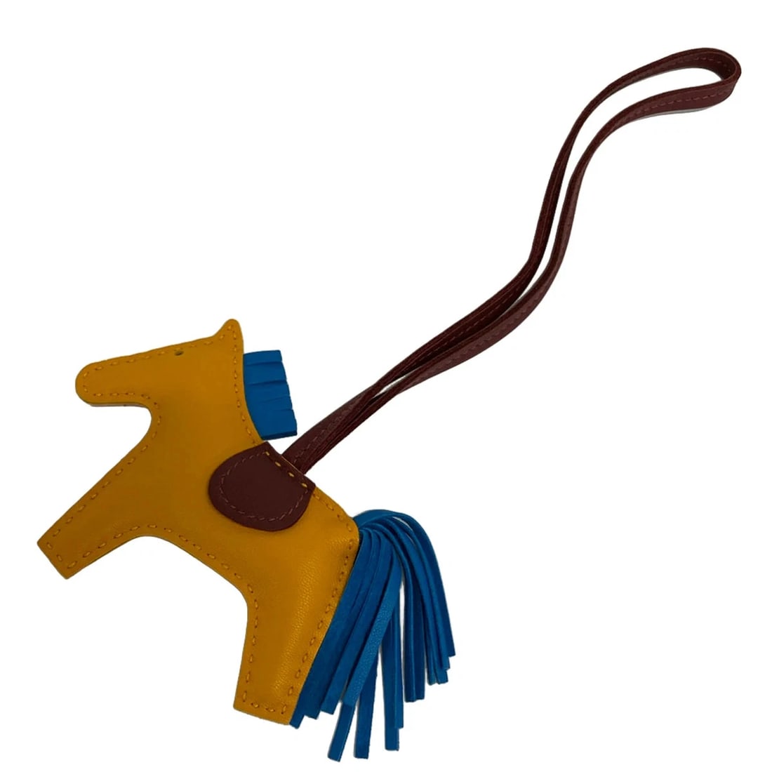 HERMES RODEO CHARM ROUGE ASH AGNEAU MILO: HERMES Rodeo Charm rouge ash Agneau Milo Brand: HERMES Type/Style: Bag Charm Material: Exterior Material Agneau Milo, Veau Swift Color: Exterior Color Jaune D'or, Blue Zanzibar, rouge ash Size: