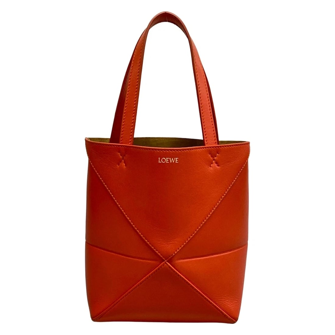 LOEWE PUZZLE FOLD TOTE MINI ORANGE CALF LEATHER TOTE BAG: LOEWE Puzzle Fold Tote Mini Orange Calf Leather Tote Bag Brand: LOEWE Type/Style: Tote Bag Material: Exterior Material Calf Leather Color: Exterior Color Orange Size: Height : 8.07 inch (20.5 cm) Widt