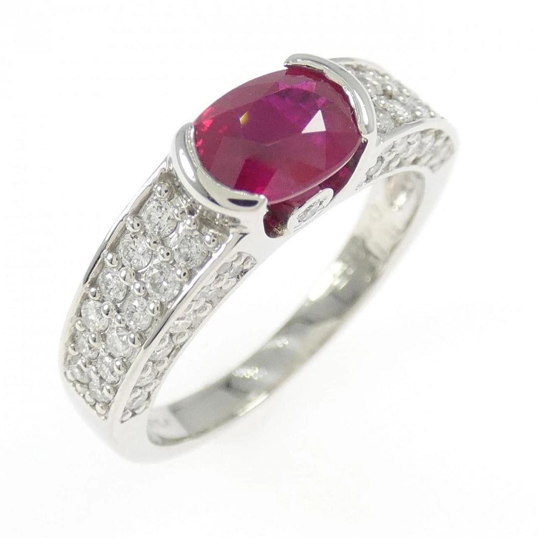 PT900 RUBY RING: PT900 Ruby Ring Brand: Unbranded Type/Style: Ruby Ring Material: Platinum900, Main Stone/Creation RubySecondary StoneDiamond Color: Platinum Size: US 6 1/4 Accessories: None Accessories No