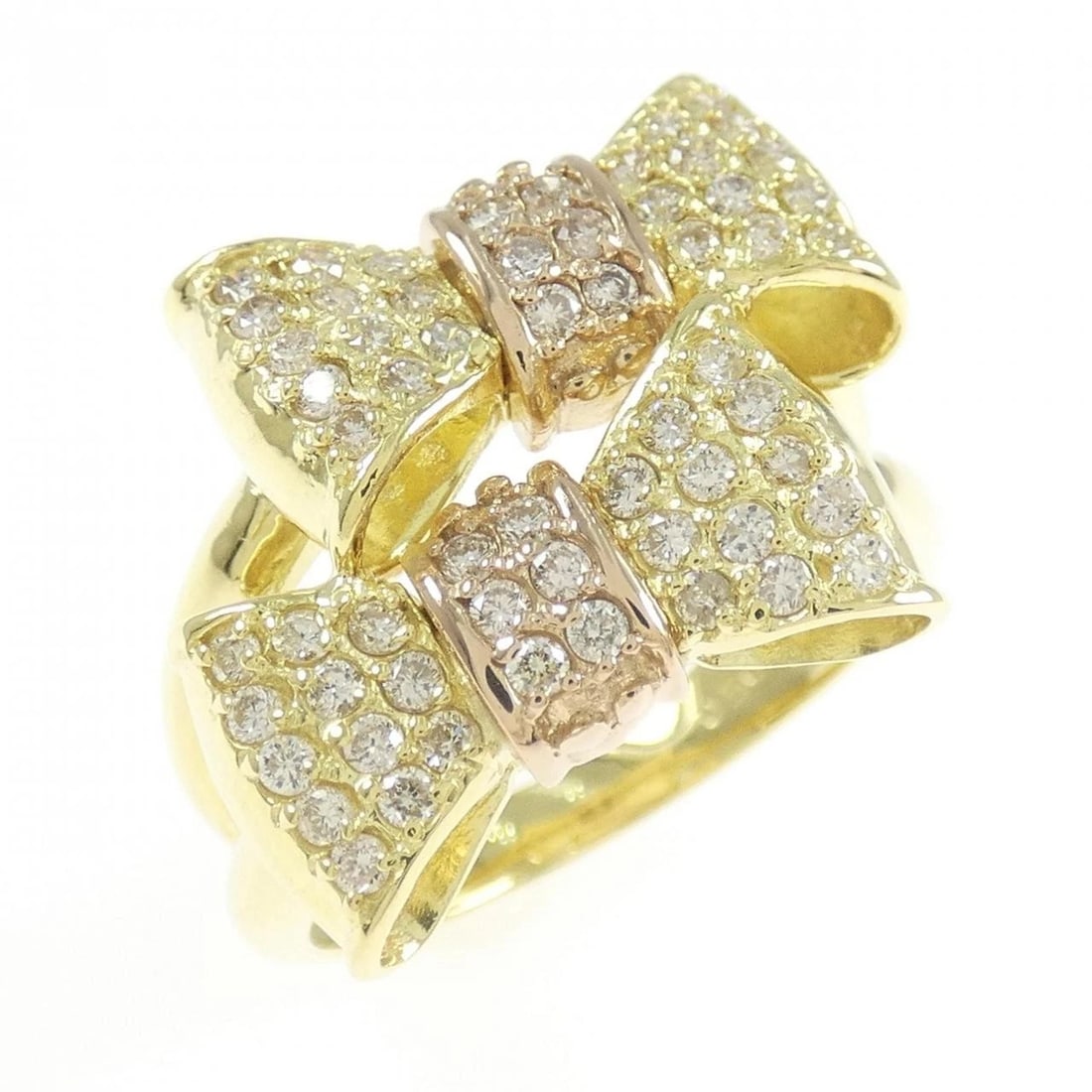 K18YG/K18PG RIBBON DIAMOND RING: K18YG/K18PG Ribbon Diamond Ring Brand: Unbranded Type/Style: Diamond Ring Material: 18K Yellow Gold, Main Stone/Creation natural Color: Yellow Gold Size: US 6 1/4 Accessories: None Accessories
