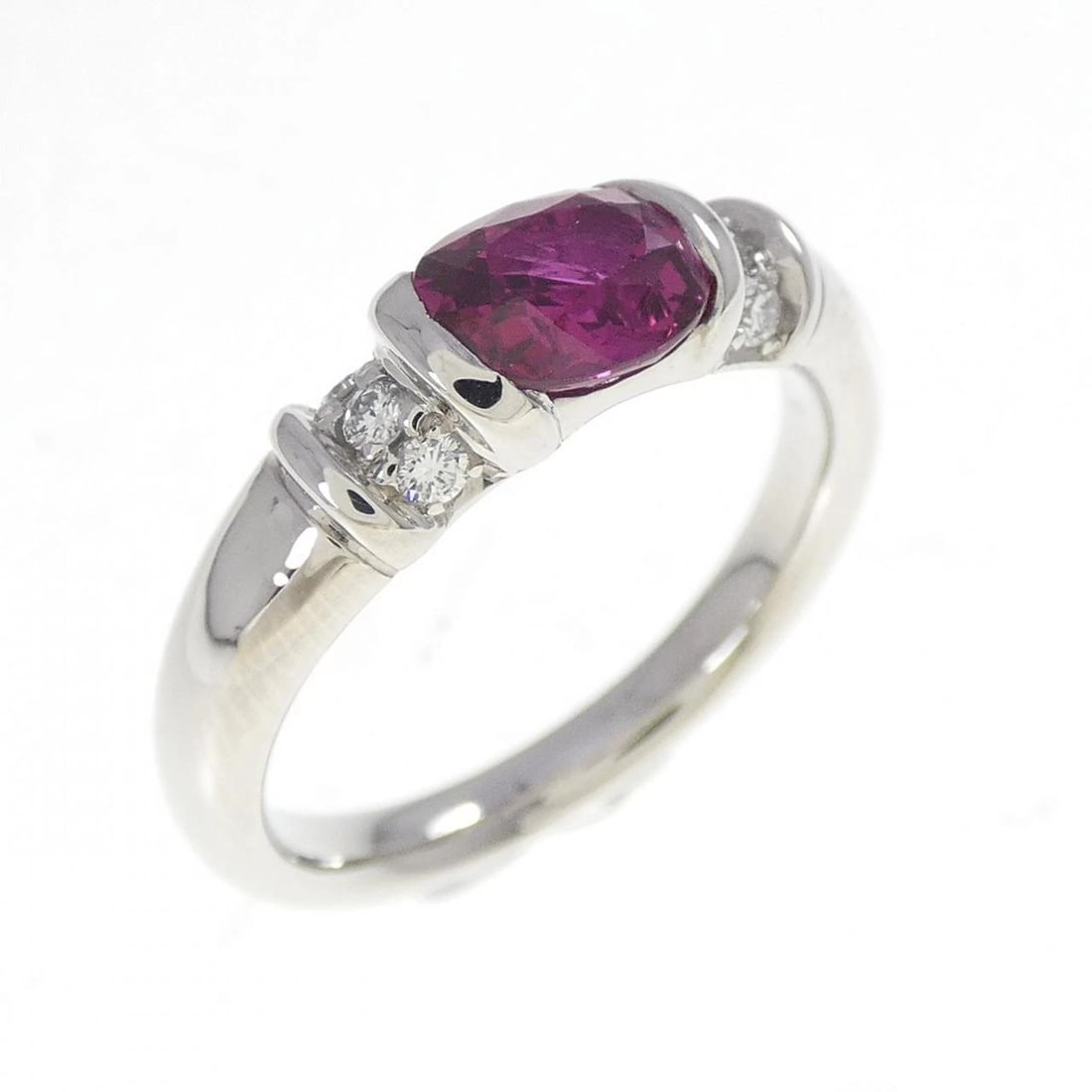 PT900 RUBY RING: PT900 Ruby Ring Brand: Unbranded Type/Style: Ruby Ring Material: Platinum900, Main Stone/Creation RubySecondary StoneDiamond Color: Platinum Size: US 6 1/4 Accessories: None Accessories Notice: When