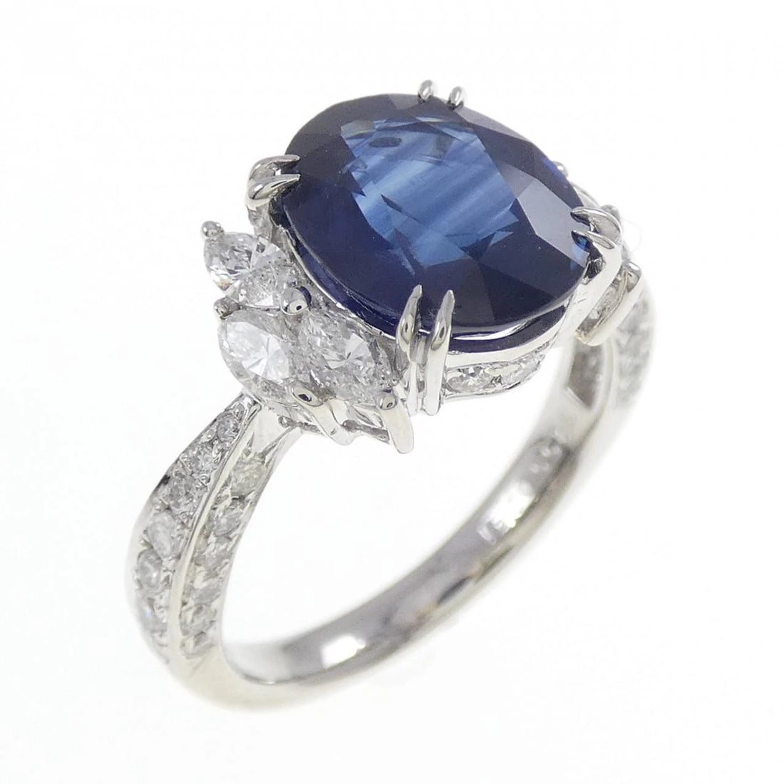 PT900 SAPPHIRE RING: PT900 Sapphire Ring Brand: Unbranded Type/Style: Sapphire Ring Material: Platinum900, Main Stone/Creation Sapphire Secondary Stone Diamond Color: Platinum Size: US 6 1/4 Accessories: None