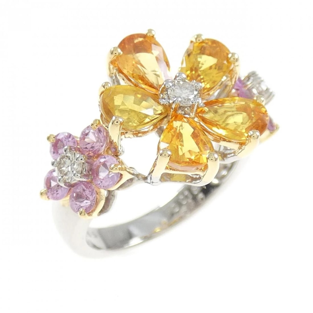 750WG/750YG FLOWER SAPPHIRE RING: 750WG/750YG Flower Sapphire Ring Brand: Unbranded Type/Style: Sapphire Ring Material: 18k White Gold18K Yellow Gold, Main Stone/Creation Sapphire Secondary Stone Diamond Color: Yellow Gold White Gold 