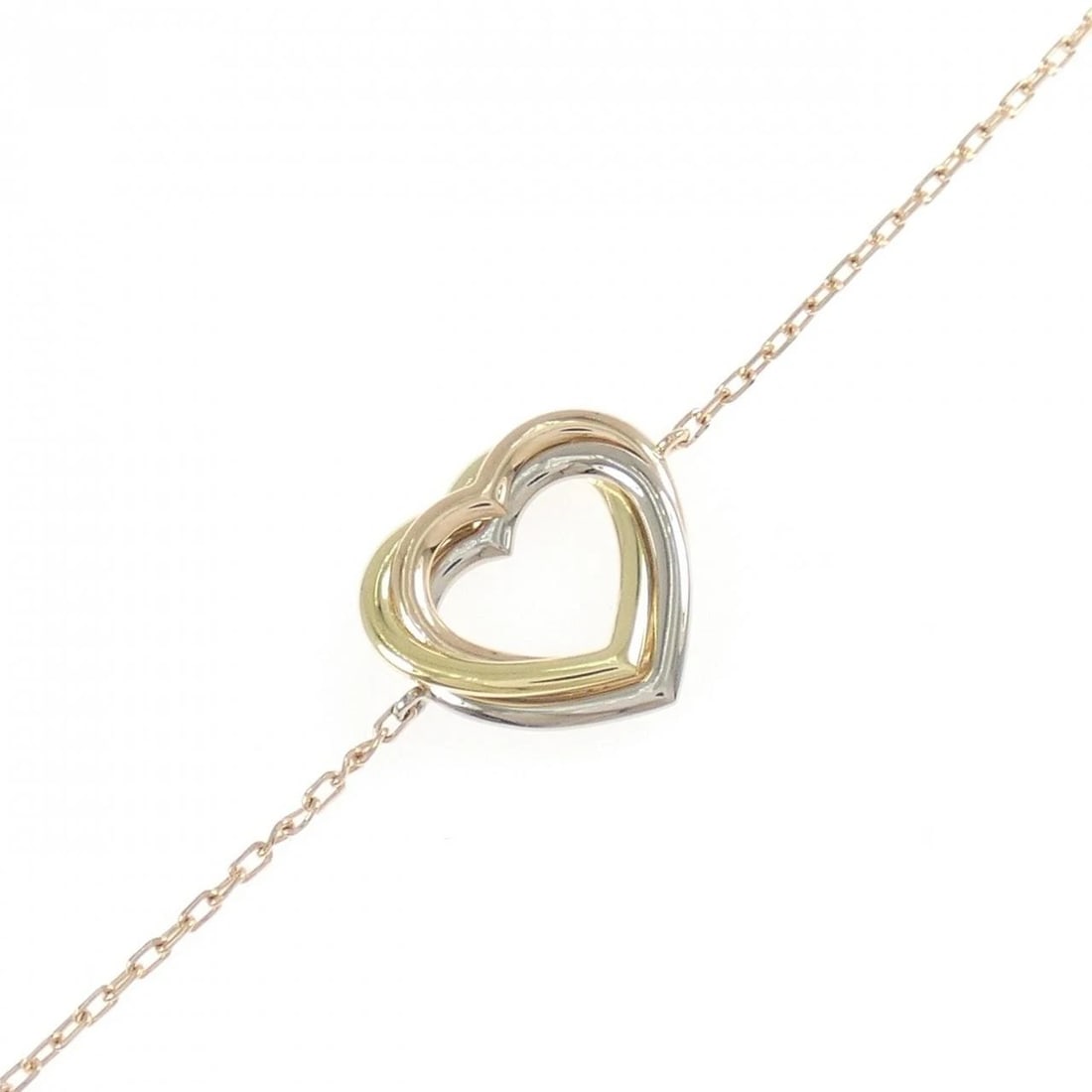 CARTIER TRINITY HEART BRACELET: Cartier Trinity Heart Bracelet Brand: CARTIER Type/Style: Bracelets Material: 750 Yellow Gold/750 White Gold/750 Pink Gold, Color: Yellow Gold/White Gold/Pink Gold Size: 16?18cmActual Size Max width