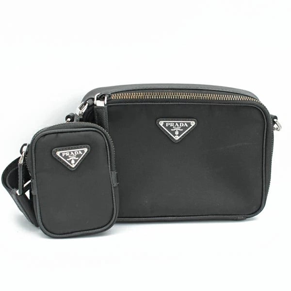 PRADA RE-NYLON/SAFFIANO LEATHER BRICK BLACK: Prada Re-Nylon/Saffiano Leather Brick Black Brand: Prada Type/Style: Handbag Material: Re-Nylon/Saffiano Leather Color: Black Size: W:19cm ? H:13cm ? D:5.5cm Accessories: None Accessories Notice:
