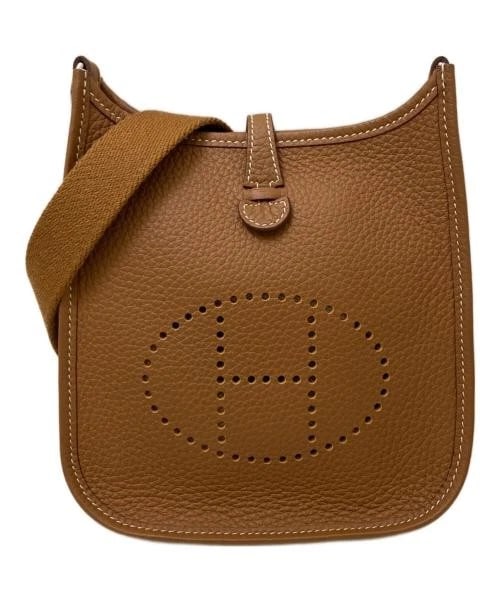 HERMES EVELYNE TPM: HERMES Evelyne TPM Brand: HERMES Type/Style: Handbag Material: Taurillon Clemence Color: Gold (Brown) Size: H:18cm / W:17cm / D:5.5cm Accessories: None Accessories Notice: When purchasing