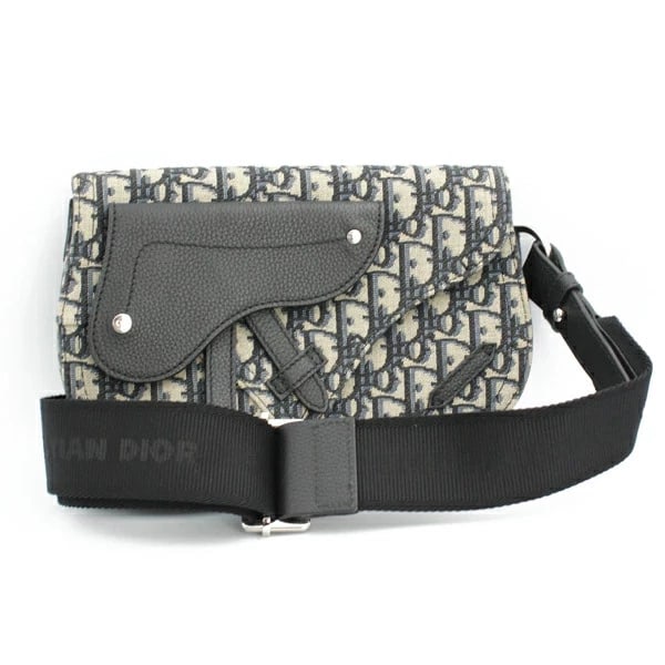 CHRISTIAN DIOR SADDLE OBLIQUE JACQUARD/LEATHER NAVY: Christian Dior Saddle Oblique Jacquard/Leather Navy Brand: Christian Dior Type/Style: Handbag Material: Oblique Jacquard/Leather Color: Navy Size: W:24cm ? H:15.5cm ? D:2cm Accessories: None