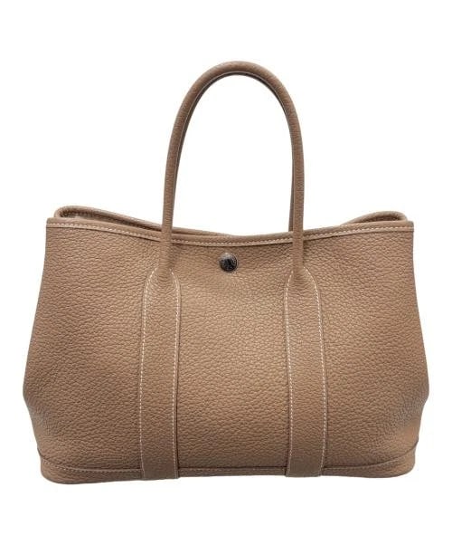 HERMES GARDEN PARTY TPM NEGONDA ETOUPE: HERMES Garden Party TPM Negonda Etoupe Brand: HERMES Type/Style: Handbag Material: Negonda Color: Etoupe X Silver Hardware Size: H:21.0cm / W:30.0cm / D:13.0cm Accessories: None Accessories Notice: