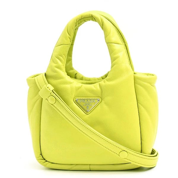 PRADA PADDED MINI HANDBAG YELLOW: Prada Padded Mini Handbag Yellow Brand: PRADA Type/Style: Handbag Material: Exterior Material Leather Color: Exterior Color Yellow Size: W:21cm ? H:17cm ? D:7.5cm Accessories: None Accesso