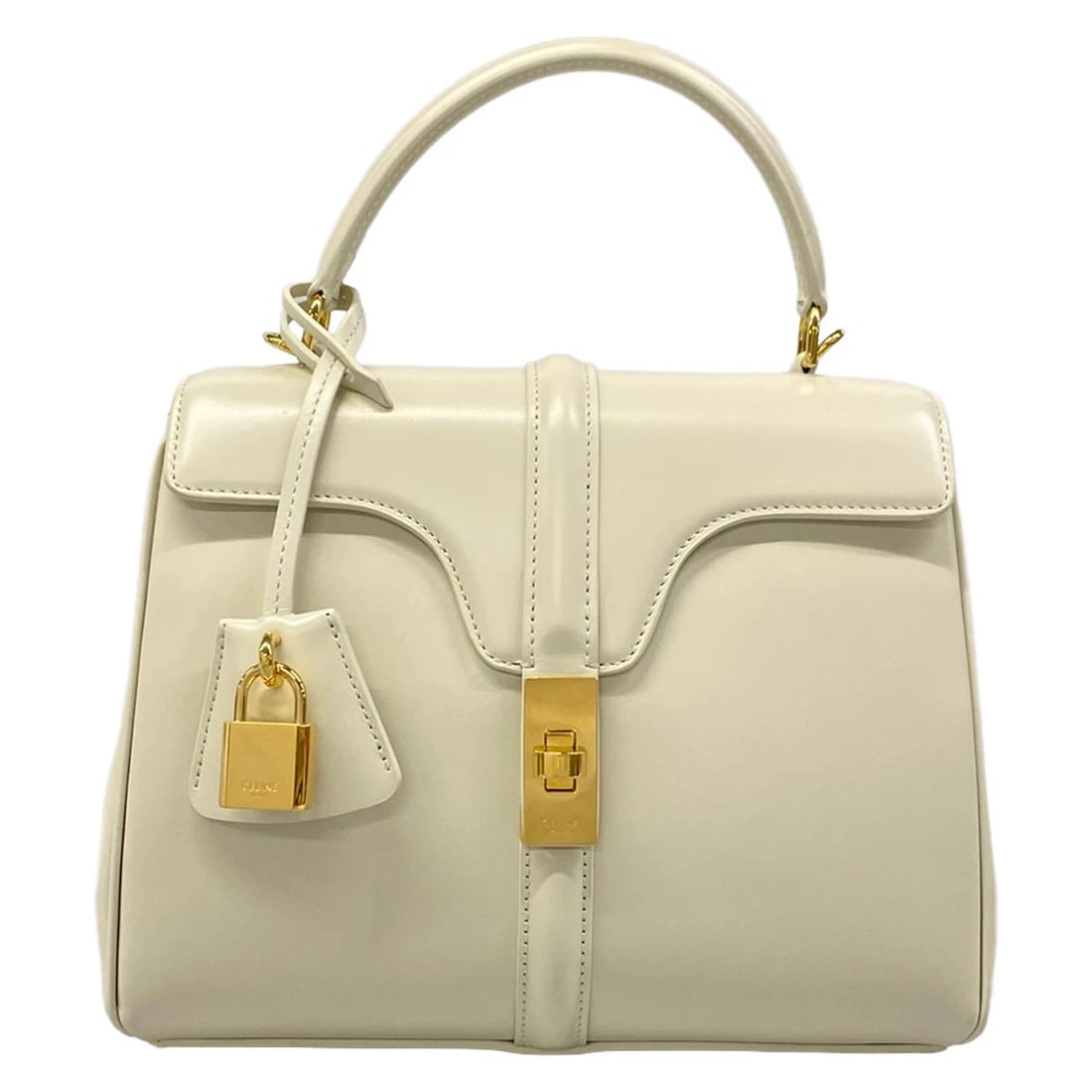 CELINE 16 SMALLCREAM LEATHER HANDBAG: CELINE 16 SmallCream Leather Handbag Brand: CELINE Type/Style: Handbag Material: Exterior Material Leather Color: Exterior Color Cream Size: Height : 7.48 inch (19 cm) Width : 8.27 inch (21 cm)9.06 in