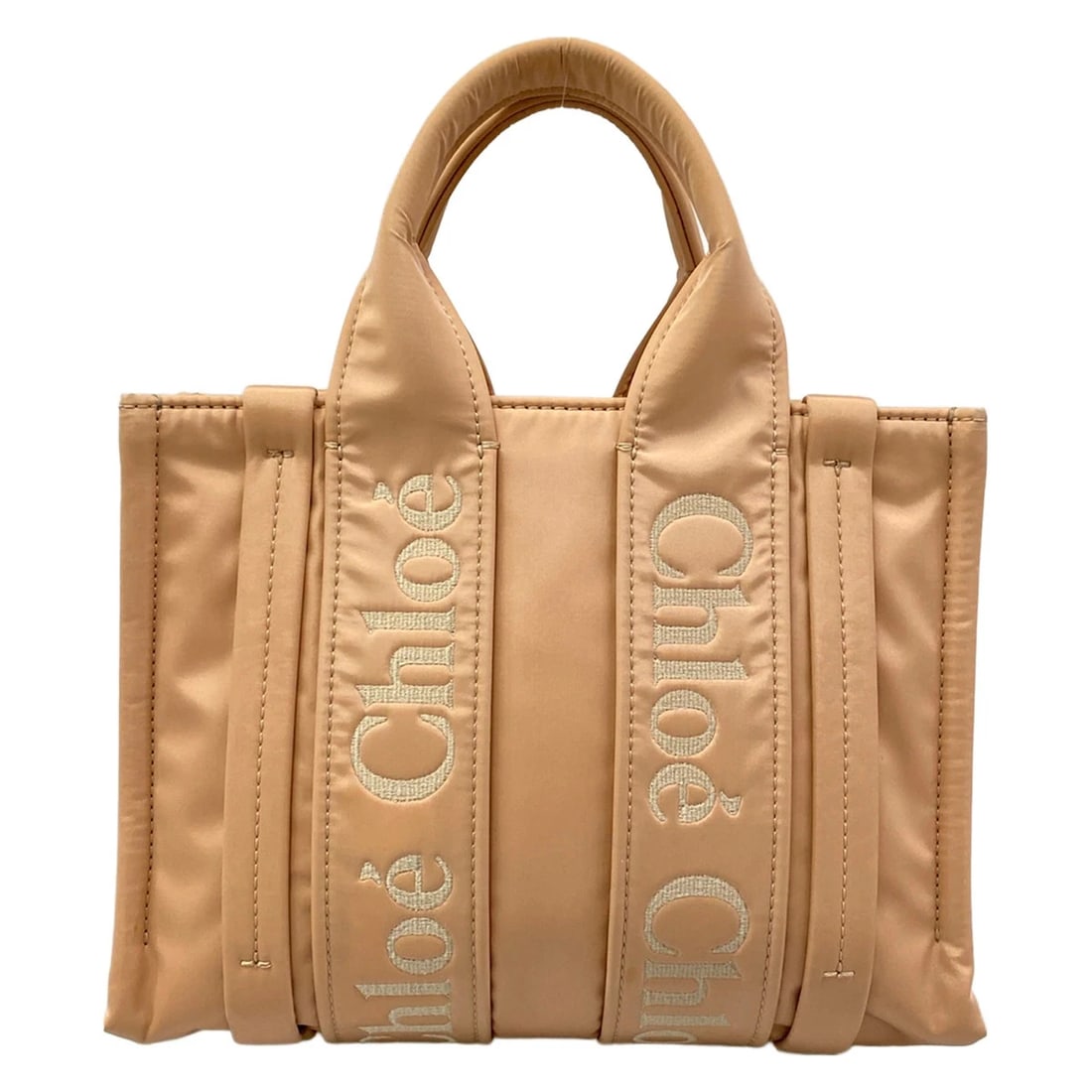 CHLOE WOODY SMALL PINK NYLONHANDBAG: Chloe Woody Small Pink NylonHandbag Brand: Chloe Type/Style: Handbag Material: Exterior Material Nylon Color: Exterior Color Pink Size: Height : 8.07 inch (20.5 cm) Width : 10.24 inch (26 cm)Depth : 3