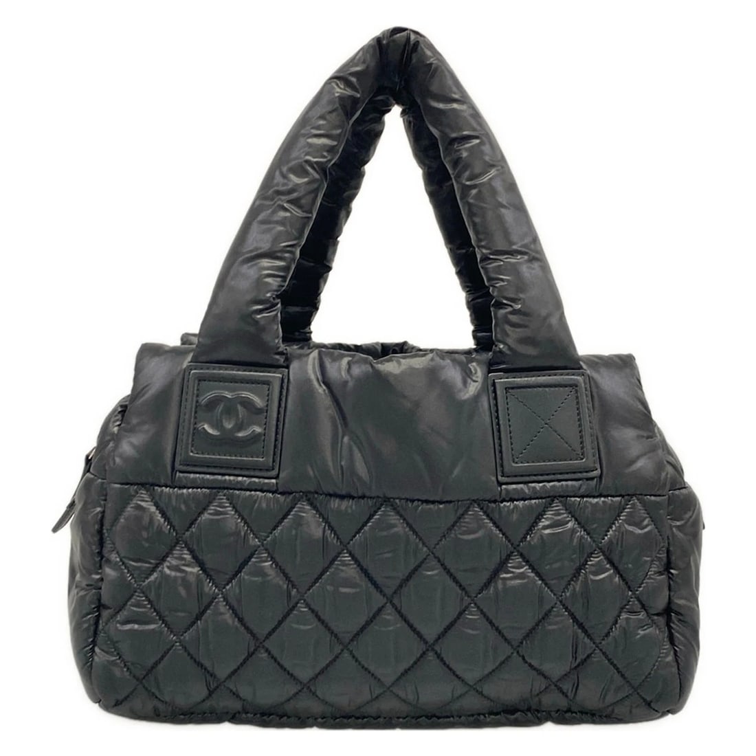CHANEL COCO COCOONBLACK NYLON HANDBAG: CHANEL Coco CocoonBlack Nylon Handbag Brand: CHANEL Type/Style: Handbag Material: Exterior Material Nylon Color: Exterior Color Black Size: Height : 7.67 inch(19.5 cm) Width : 10.63 inch (27 cm)11.81 