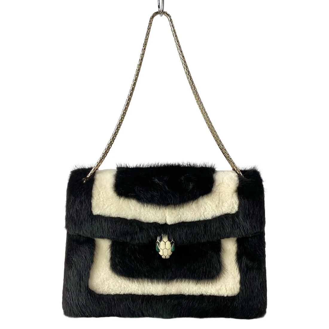 BVLGARI SERPENTI FOREVERBLACK WHITE FUR LEATHER SHOULDER BAG: BVLGARI Serpenti ForeverBlack White Fur Leather Shoulder Bag Brand: BVLGARI Type/Style: Shoulder Bag Material: Exterior Material Fur, Leather Color: Exterior Color Black, White Size: Height : 7.48 inc