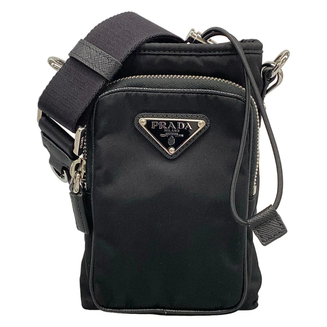 PRADA RE-NYLON SMART PHONE CASE BLACK NYLON LEATHERSHOULDER BAG: PRADA Re-Nylon Smart Phone Case Black Nylon LeatherShoulder Bag Brand: PRADA Type/Style: Shoulder Bag Material: Exterior Material Nylon, Leather Color: Exterior Color Black Size: Height : 7.87 inch (2