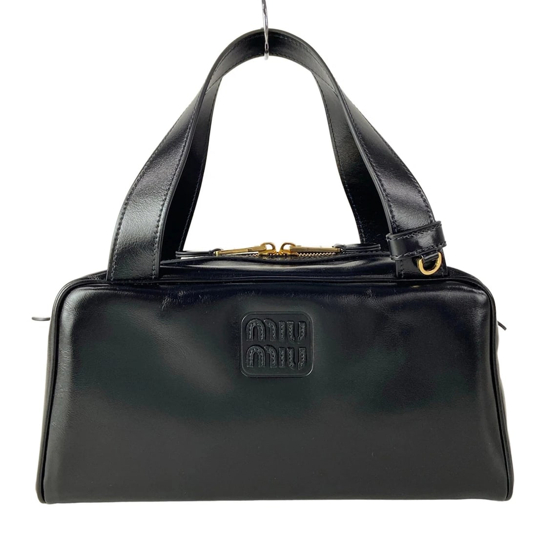 MIUMIU BLACK CALF LEATHER HANDBAG: miumiu Black Calf Leather Handbag Brand: miumiu Type/Style: Handbag Material: Exterior Material Calf Leather Color: Exterior Color Black Size: Height : 5.51 inch (14 cm) Width : 11.02 inch (28 cm) Dep