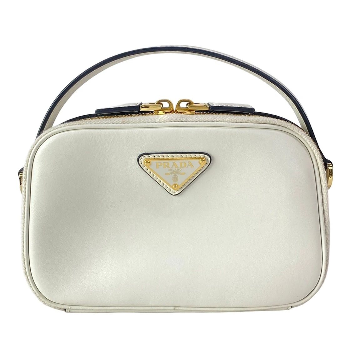 PRADA ODETTE CREAM CALF LEATHERHANDBAG: PRADA Odette Cream Calf LeatherHandbag Brand: PRADA Type/Style: Handbag Material: Exterior Material Calf Leather Color: Exterior Color Cream Size: Height : 4.72 inch" (12 cm) Width: 7.28" (18.5 cm) De