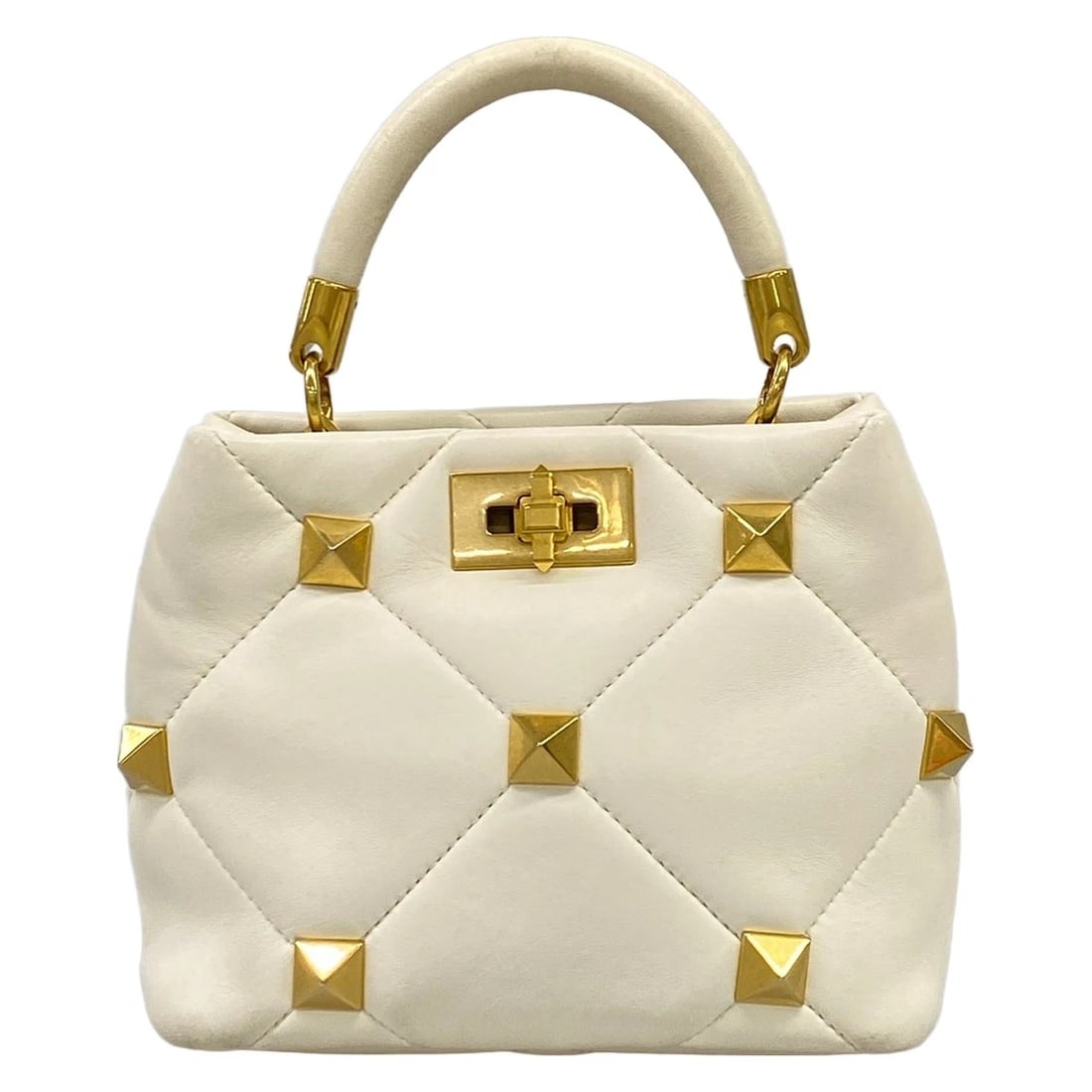 VALENTINOGARAVANI CREAM LEATHER HANDBAG: VALENTINOGARAVANI Cream Leather Handbag Brand: VALENTINOGARAVANI Type/Style: Handbag Material: Exterior Material Leather Color: Exterior Color Cream Size: Height : 6.69 inch (17 cm) Width : 7.48 inch 