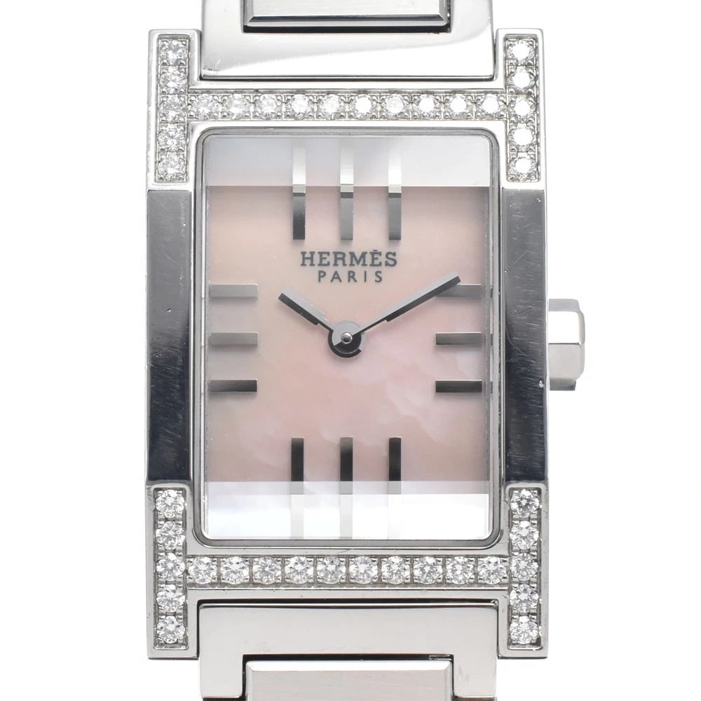 HERMES TANDEM DIAMOND BEZEL PINK SHELL DIAL QUARTZ LADIES WATCH: HERMES tandem Diamond Bezel Pink shell Dial Quartz Ladies Watch Brand: HERMES Type/Style: Wristwatch Material: Band Material Stainless Steel, Case Material Stainless Steel Color: Band Color Silver,