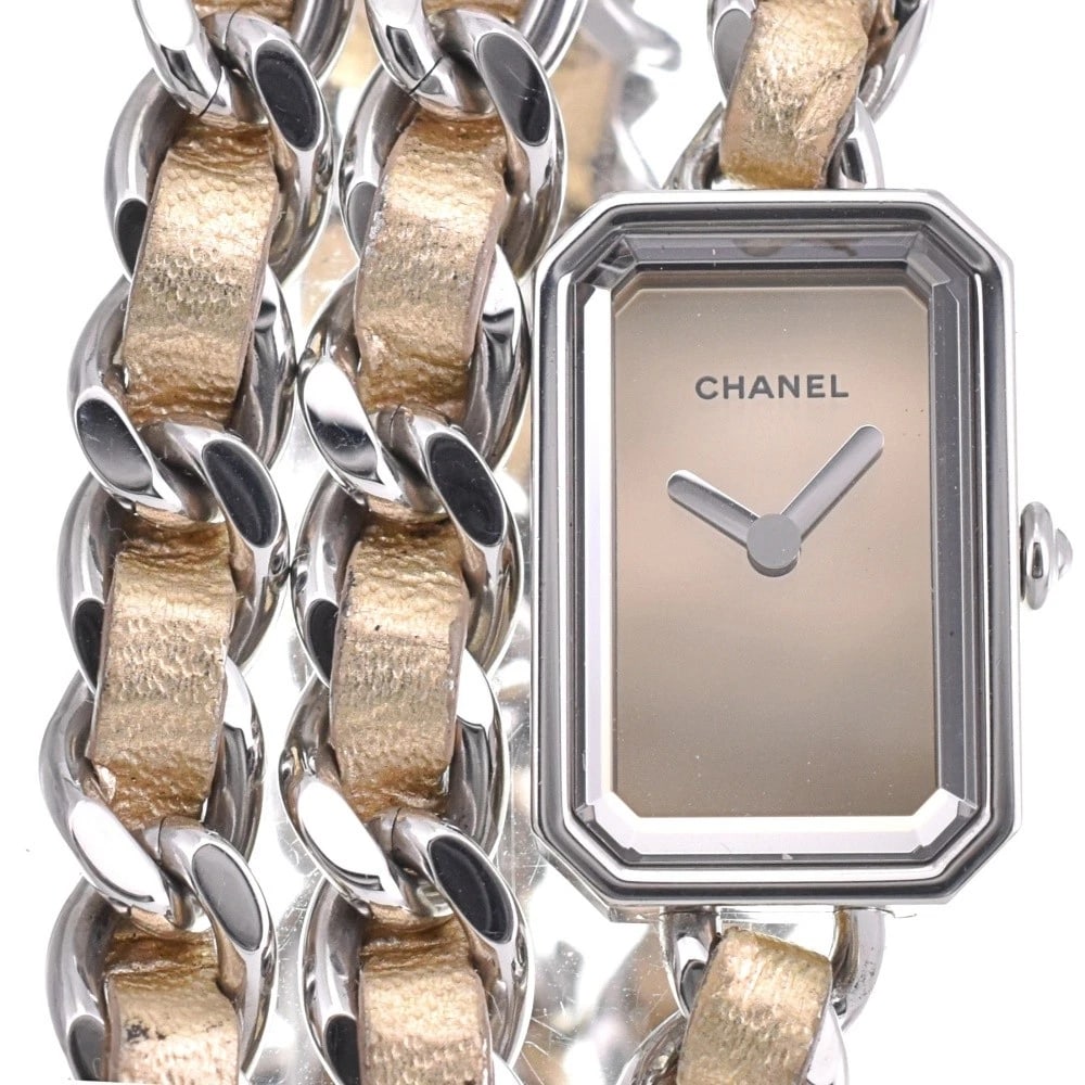 CHANEL PREMIERE LOCK XS MIRROR DIAL LADIES WATCH: CHANEL Premiere Lock XS mirror Dial Ladies Watch Brand: CHANEL Type/Style: Wristwatch Material: Band Material Stainless Steel, Case Material Stainless Steel Color: Band Color Silver / Gold, Dial Color