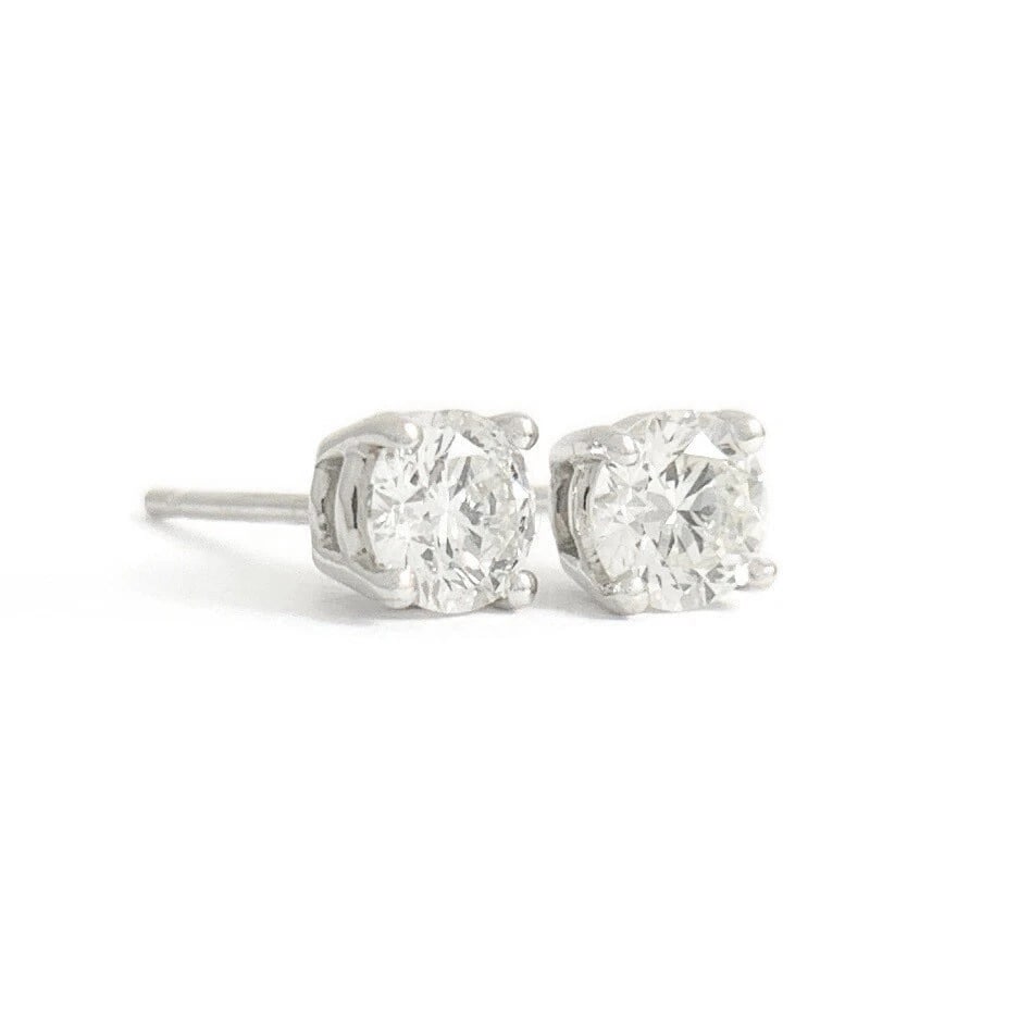 ROUND DIAMOND STUD EARRINGS 14K WHITE GOLD: Round Diamond Stud Earrings 14K White Gold Brand: none Type/Style: Earrings Material: 14K White Gold, Main Stone/Creation Natural Color: White Size: Measurements: 4.3 mm Accessories: None Accessories