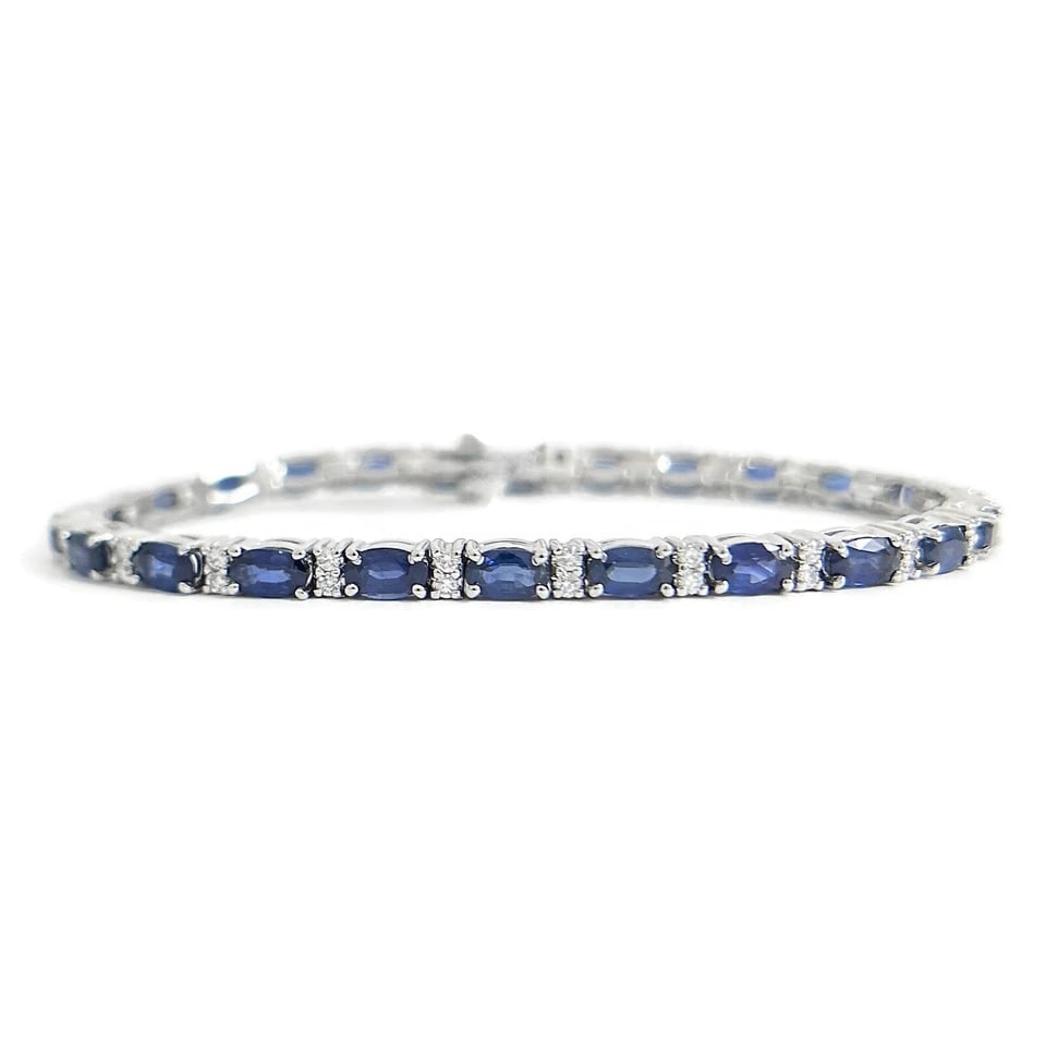 OVAL BLUE SAPPHIRE DIAMOND GEMSTONE TENNIS BRACELET: Oval Blue Sapphire Diamond Gemstone Tennis Bracelet Brand: none Type/Style: Bracelet Material: 14K White Gold, Main Stone/Creation Natural Color: Blue Size: Length: 7 inches Width: 3.4 mm Accessor