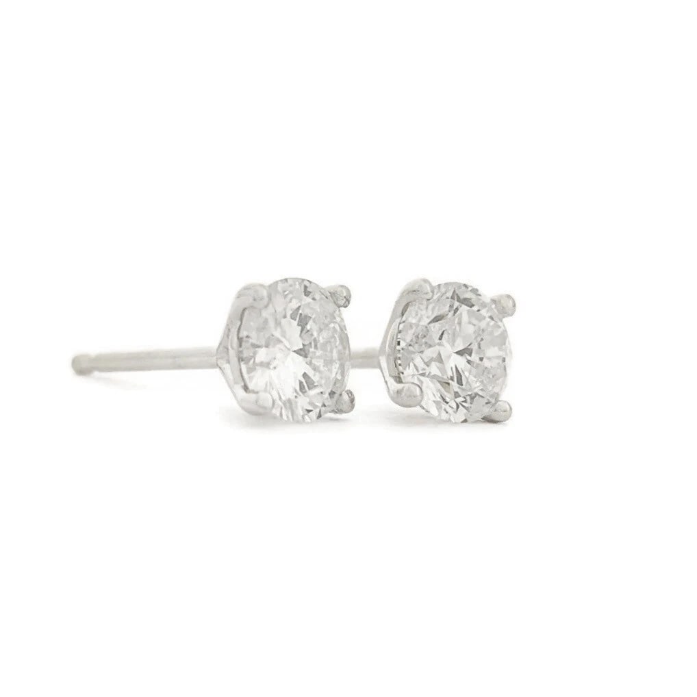 ROUND DIAMOND STUD EARRINGS 14K WHITE GOLD: Round Diamond Stud Earrings 14K White Gold Brand: none Type/Style: Earrings Material: 14K White Gold, Main Stone/Creation Natural Color: White Size: Measurements: 4.35 mm Accessories: None