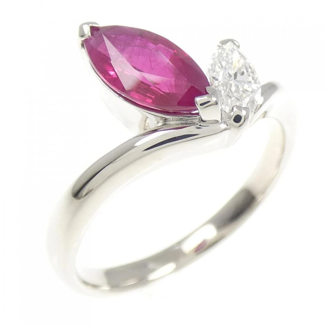 PT900 RUBY RING: PT900 Ruby Ring Brand: Unbranded Type/Style: Ruby Ring Material: Platinum900, Main Stone/Creation RubySecondary Stone Diamond Color: Platinum Size: US 6 1/2 Accessories: None Accessories Notice: When